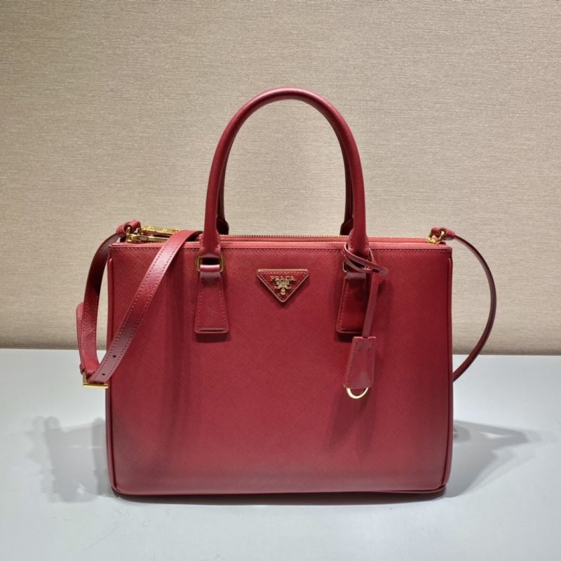 Pra*a top handle bags